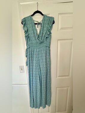 Francesca’s Light Blue-Green Floral Jumpsuit